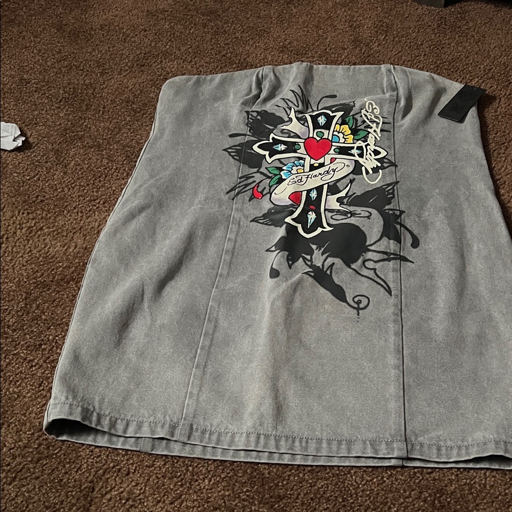 EdHardy halter dress strapless and very cute and an eye turner.